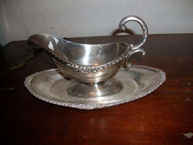 Lovely and ornate gravy boat